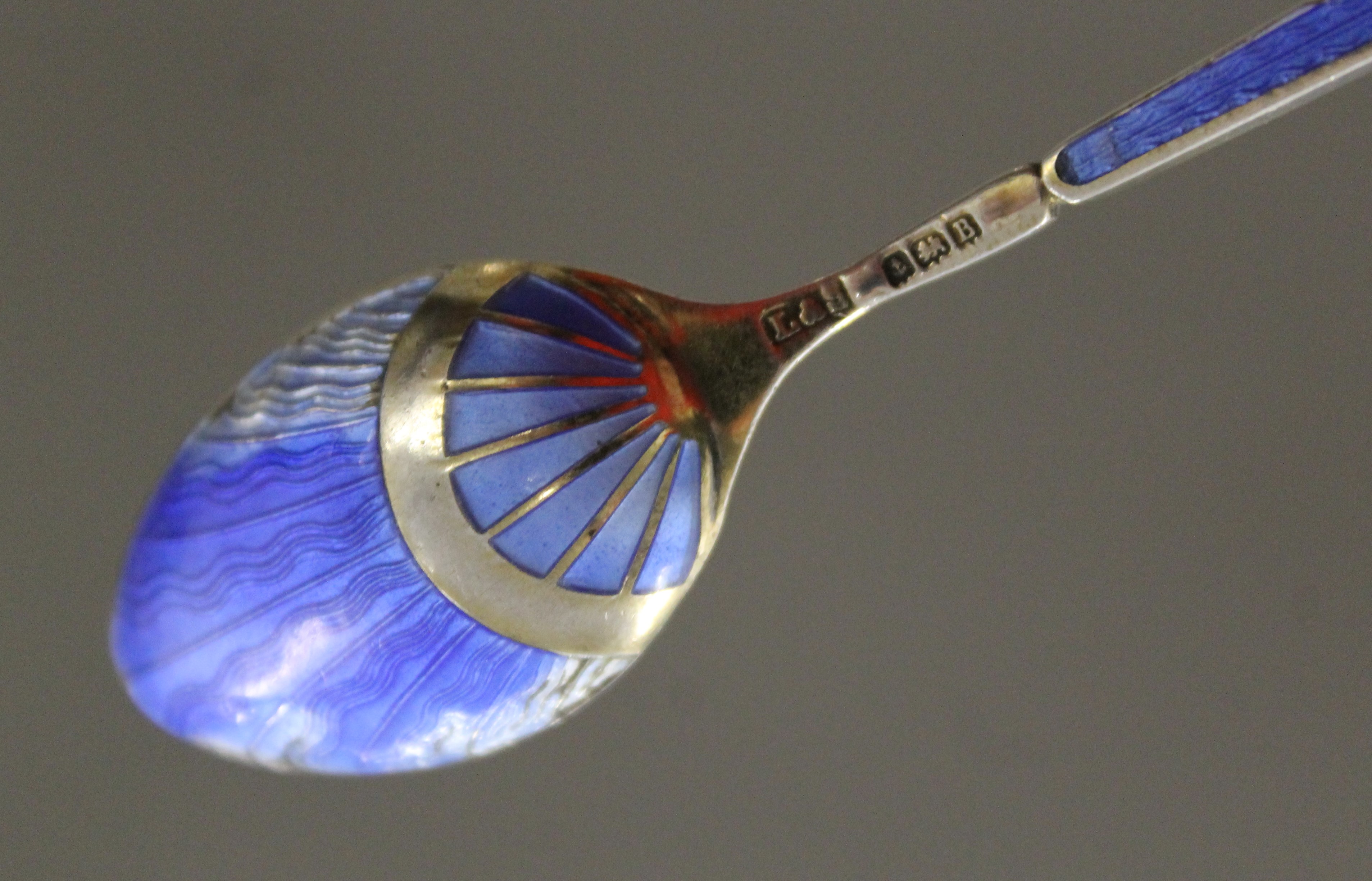 A cased set of silver and enamel tea spoons. - Image 5 of 5