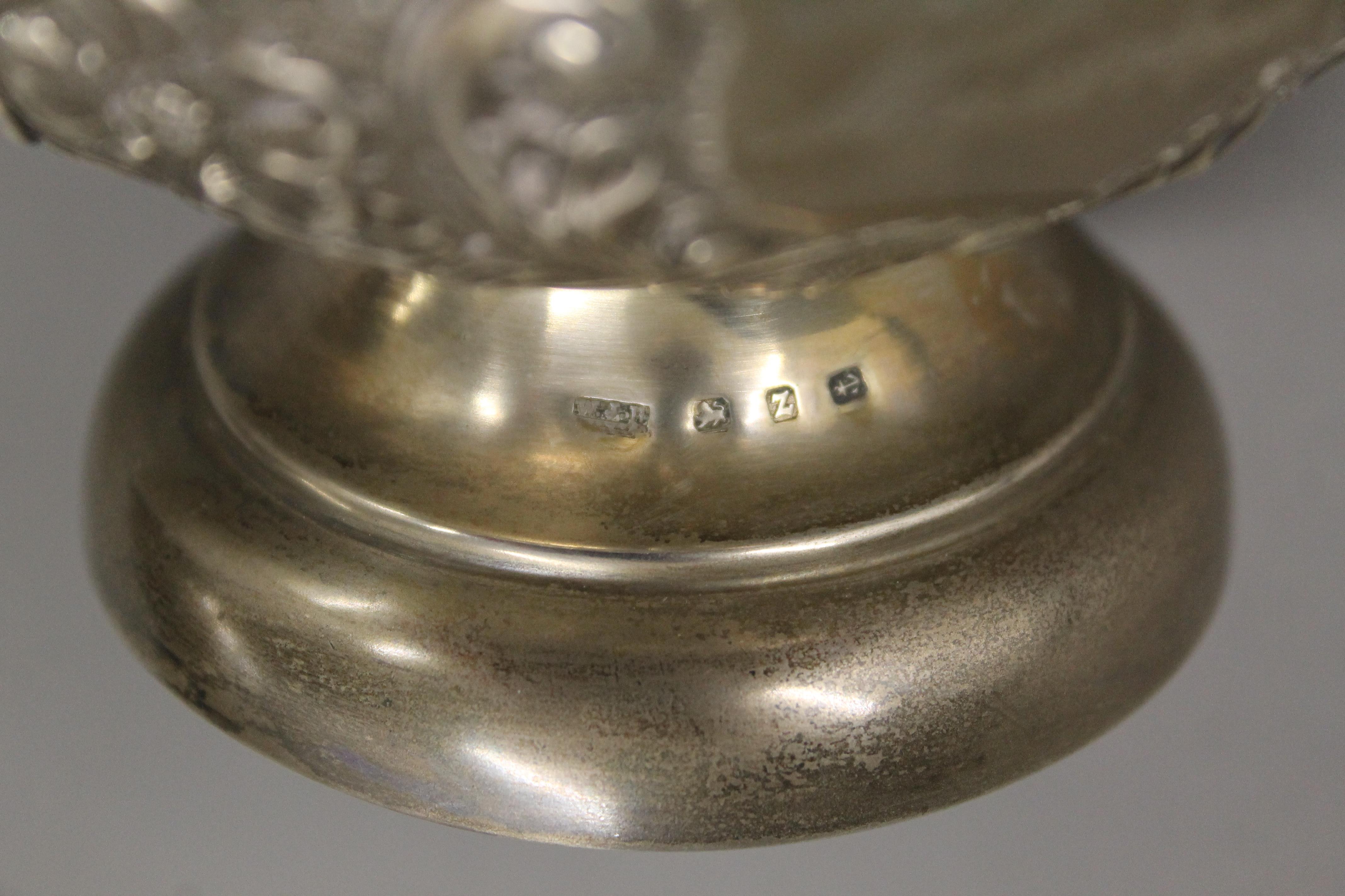 A silver embossed bowl. 8 cm high. - Image 4 of 5