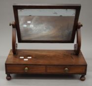 A 19th century mahogany two drawer toilet mirror. 52 cm wide.