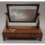 A 19th century mahogany two drawer toilet mirror. 52 cm wide.