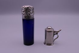 A silver and Bristol blue glass scent bottle and a scent bottle formed as Georgian tankard.