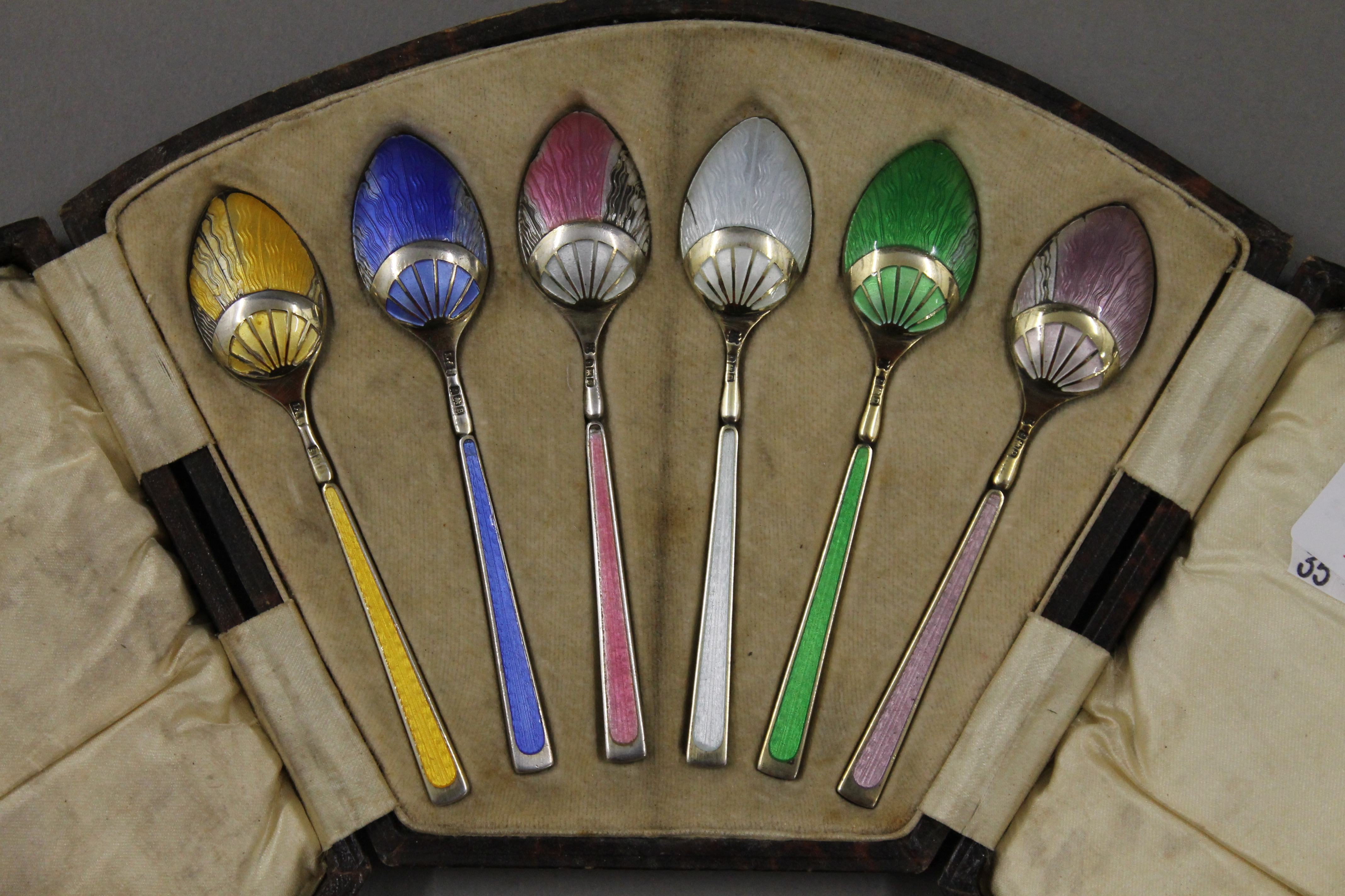 A cased set of silver and enamel tea spoons. - Image 2 of 5