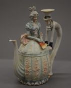 A 19th century Continental porcelain figural teapot. 25.5 cm high.