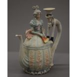 A 19th century Continental porcelain figural teapot. 25.5 cm high.