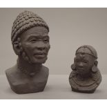 Two African terracotta busts, each signed to reverse. The largest 24 cm high.