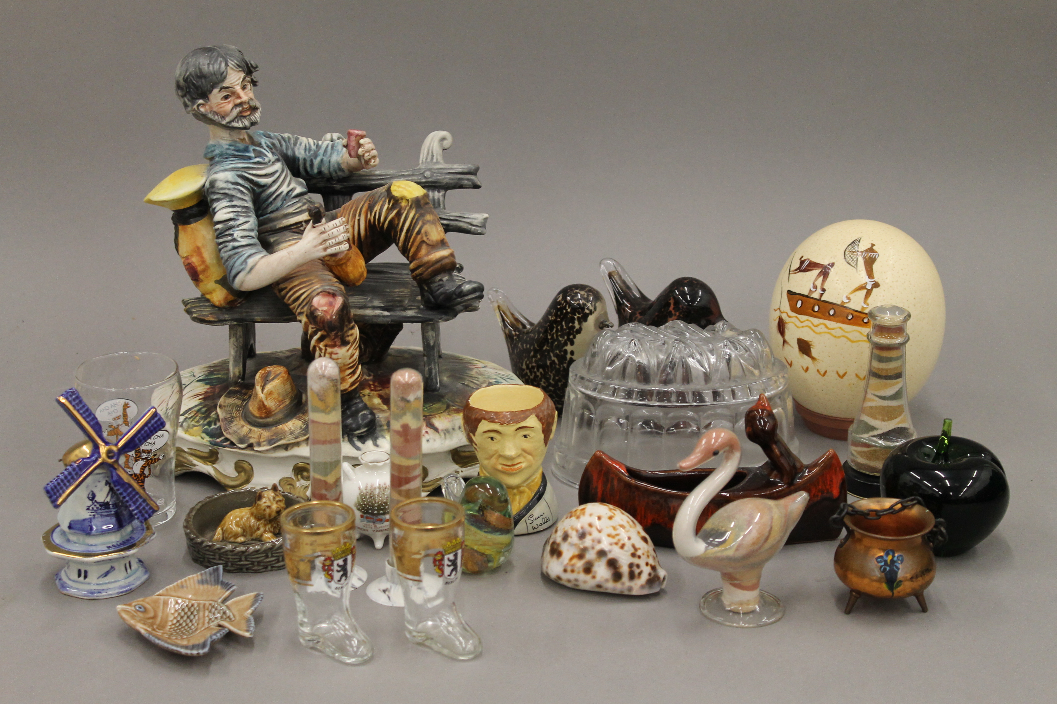 A quantity of various porcelain, paperweights and a Capodimonte tramp.