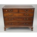 A George III mahogany chest of drawers. 118 cm wide.