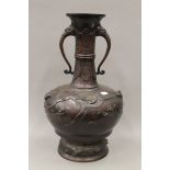 A late 19th century Japanese bronze vase. 51 cm high.
