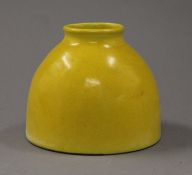 A Chinese yellow beehive porcelain brush pot. 10 cm high.