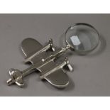 An aeroplane form magnifying glass. 23.5 cm long.