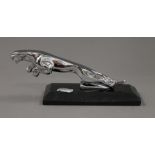 A Jaguar car mascot on a plinth base. 20.5 cm long.