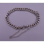 A silver curb bracelet. 19 cm long. 29 grammes.