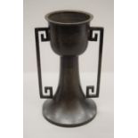 An Oriental silver inlaid bronze vase with twin handles. 26.5 cm high.