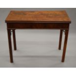 A George III mahogany folding card table. 90 cm wide.