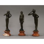 A set of three Art Nouveau style bronze model of young ladies. The largest 22 cm high.