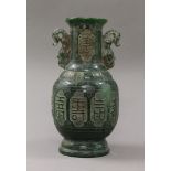 A Chinese jade vase. 25 cm high.