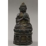 A bronze model of buddha. 28.5 cm high.