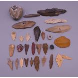 A collection of stone arrowheads, etc.