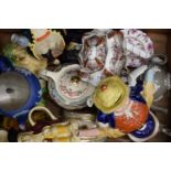 A collection of various vintage porcelain teapots.