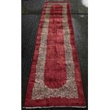 A Kirman runner. 460 x 110 cm.