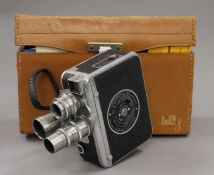 A vintage cased movie camera.