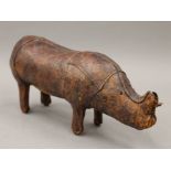 A Liberty style vintage leather model of a rhinoceros. 30 cm long.