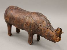A Liberty style vintage leather model of a rhinoceros. 30 cm long.