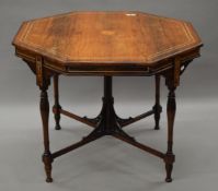 A Victorian inlaid rosewood octagonal centre table. 90 cm wide.