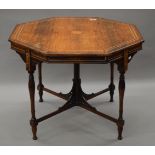 A Victorian inlaid rosewood octagonal centre table. 90 cm wide.