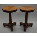 A pair of mahogany tripod side tables. 44 cm diameter.