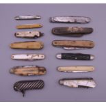 A collection of various vintage penknives.