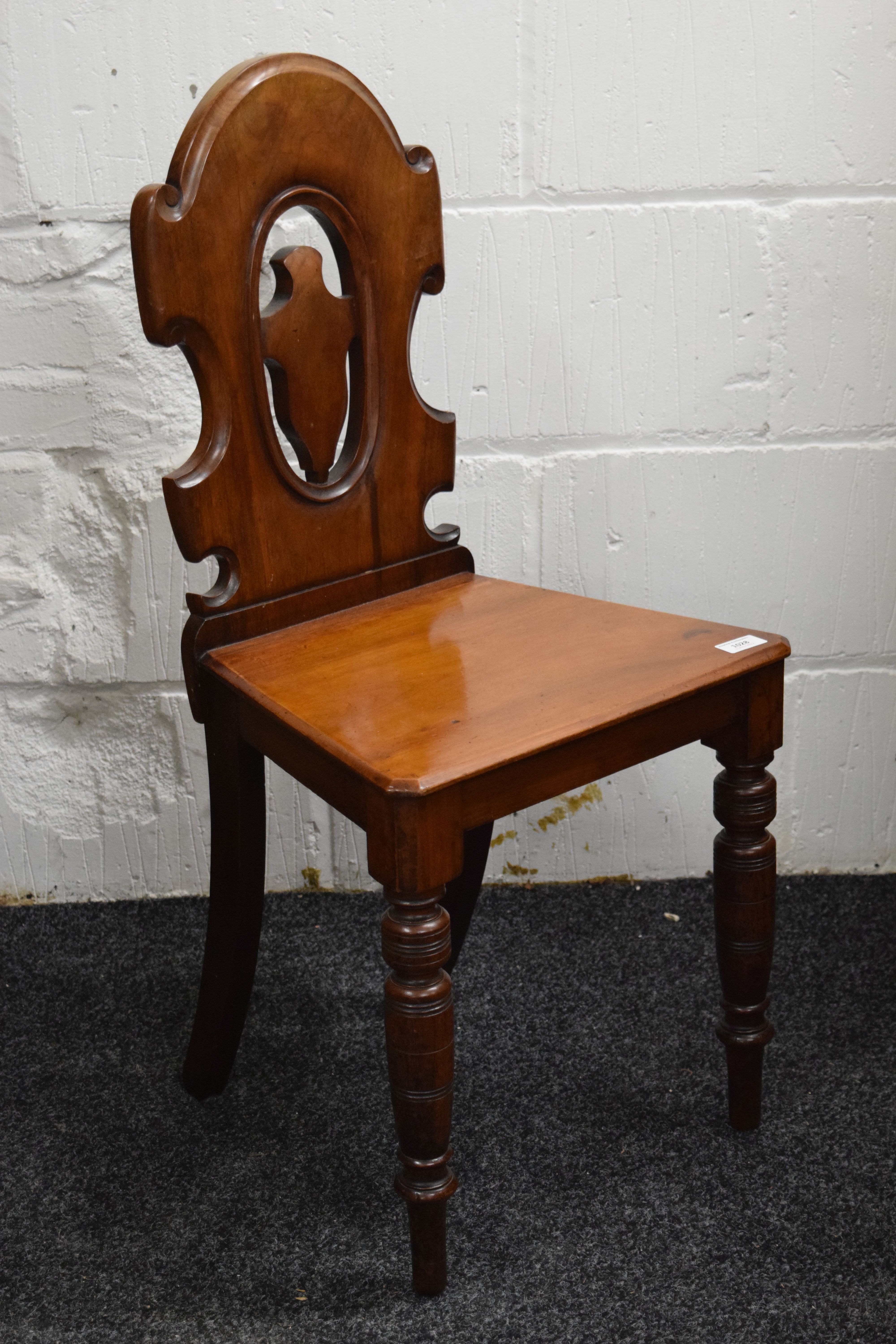 A Victorian mahogany hall chair. - Image 3 of 4