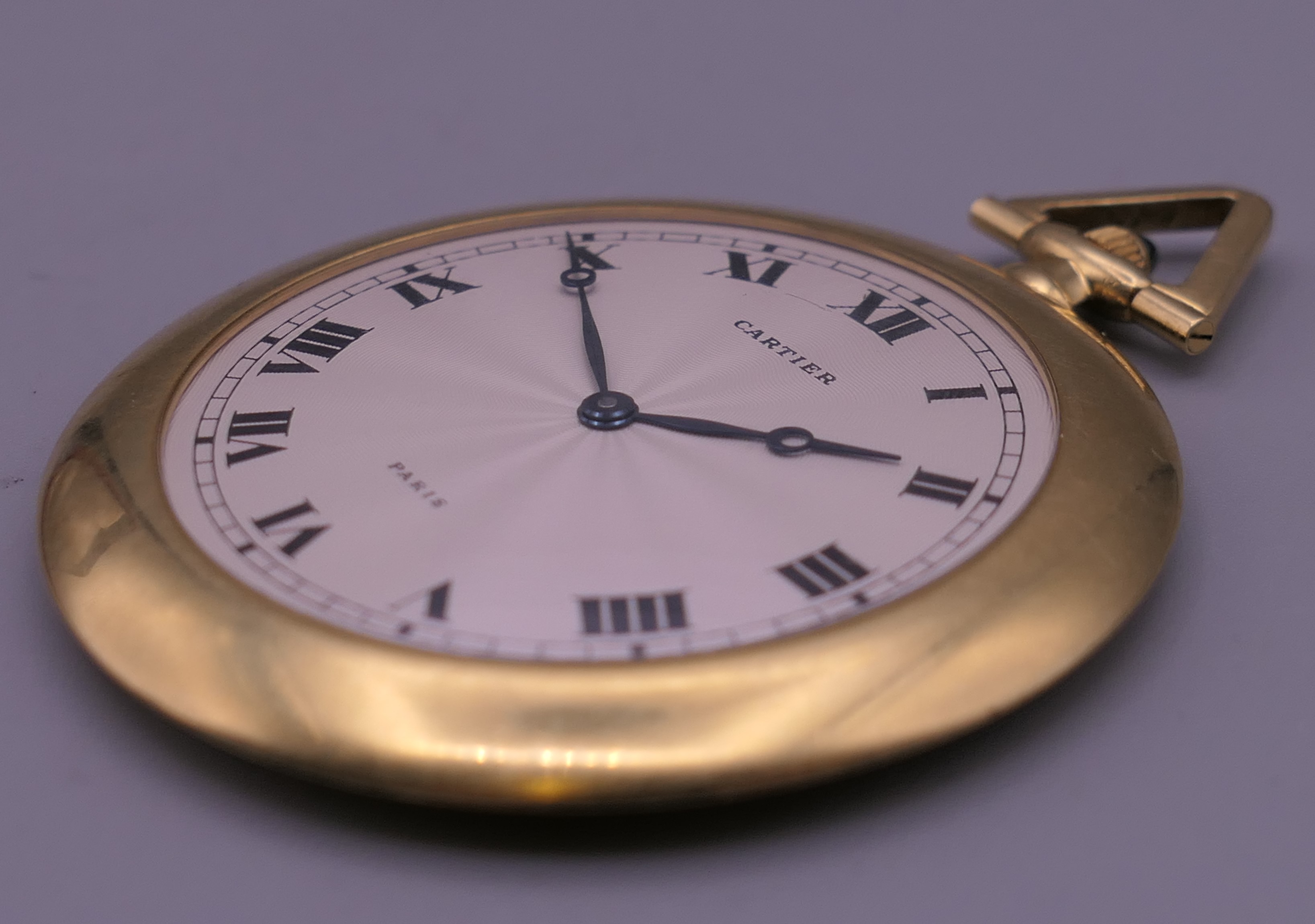 A Cartier 18 K gold open face keyless lever pocket watch, in Cartier box. 5 cm diameter. - Image 8 of 11