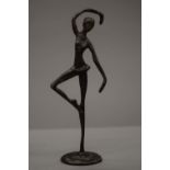A Hagenauer style bronze model of a ballerina. 27 cm high.