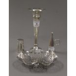 A silver bud vase, a silver candle snuffer,