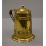 An army and navy brass lidded tankard. 14 cm high.