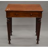 A Victorian mahogany single drawer side table. 68.5 cm wide.