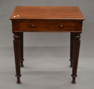 A Victorian mahogany single drawer side table. 68.5 cm wide.