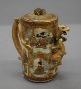 A 19th century Satsuma teapot. 11 cm high.