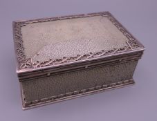 A silver mounted shagreen cigarette box, with makers mark of Omar Ramsden. 13.5 cm wide.