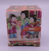 A small 19th century Canton famille rose porcelain box, possibly a cricket cage. 5 cm high.