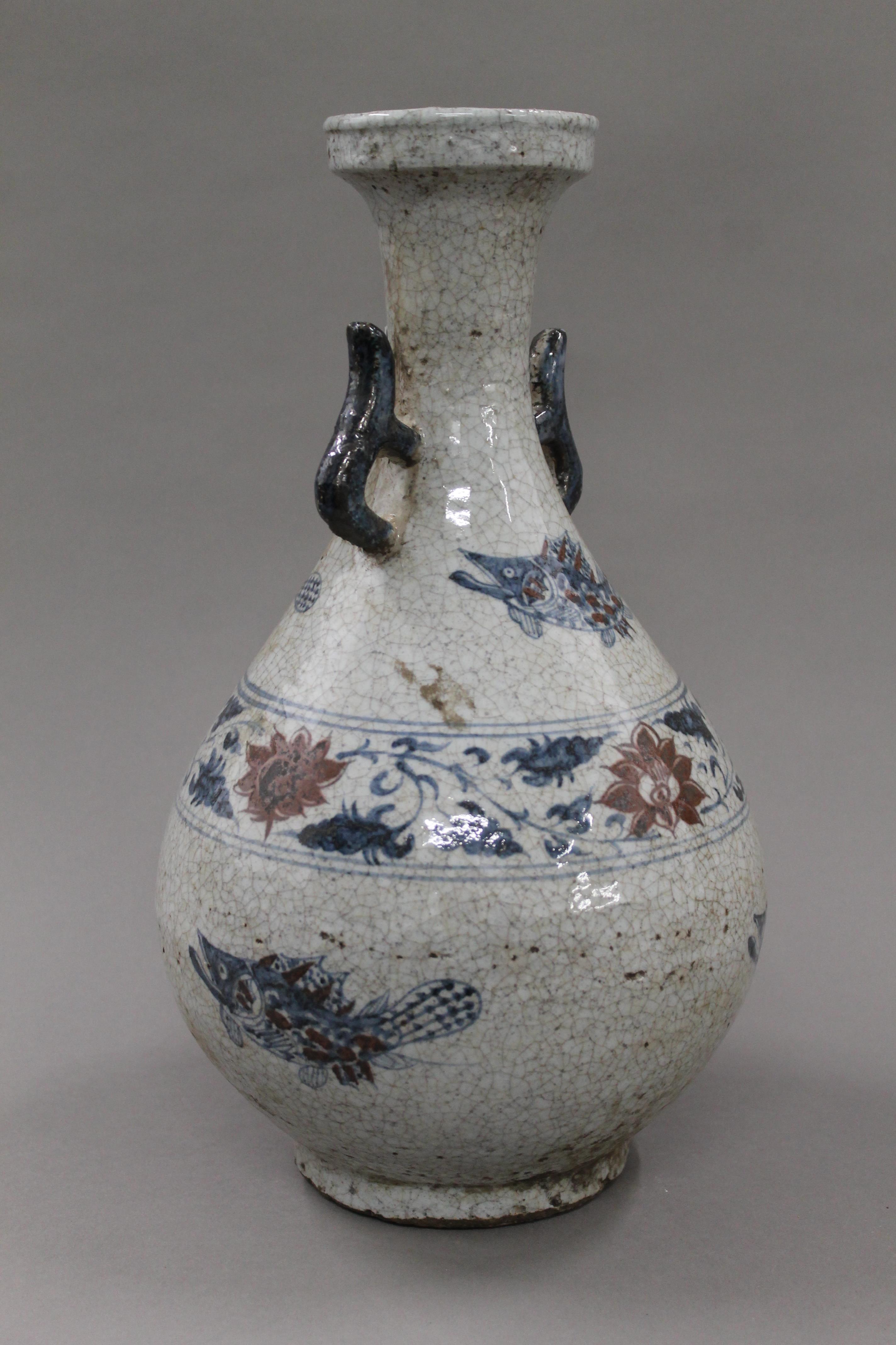 A Chinese blue and brown porcelain vase. 35 cm high. - Image 2 of 4