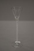 An air twist cordial glass. 18 cm high.