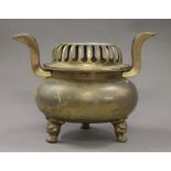 A large Chinese bronze lidded censer. 27 cm high.