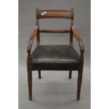 A 19th century mahogany rope twist open arm chair. 50.5 cm wide.