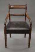 A 19th century mahogany rope twist open arm chair. 50.5 cm wide.