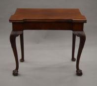 An 18th century mahogany folding card table,
