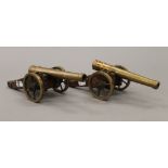 A pair of small model cannons. 28 cm long.