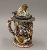 A 19th century Continental metal mounted porcelain stein. 21 cm high.