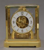 An Atmos clock. 23 cm high.